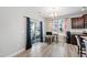 Open floor plan with a sliding glass door leading to outdoor space and adjacent office area, offering modern living at 147 Antler Steel Dr, Clayton, NC 27527