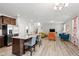 Bright and airy open-concept living area adjacent to the kitchen, great for gatherings and entertaining at 147 Antler Steel Dr, Clayton, NC 27527