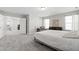 Bright main bedroom with a view into the bathroom and bonus room at 147 Antler Steel Dr, Clayton, NC 27527