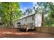 Spacious backyard features a deck and privacy fence at 1609 Falls Ct, Raleigh, NC 27615
