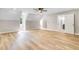 Large, versatile bonus room featuring light floors and multiple windows for abundant natural light at 1609 Falls Ct, Raleigh, NC 27615