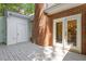 Wooden deck with double doors to enter living space at 1623 Village Glenn Dr, Raleigh, NC 27612
