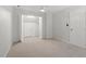 Bedroom with a neutral color palette and featuring attic access at 1623 Village Glenn Dr, Raleigh, NC 27612