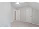 Bedroom featuring a neutral color palette and dormer windows at 1623 Village Glenn Dr, Raleigh, NC 27612
