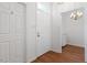 Inviting foyer with hardwood floors leading to living areas at 1623 Village Glenn Dr, Raleigh, NC 27612