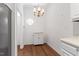 Bright kitchen area with modern appliances and hardwood flooring at 1623 Village Glenn Dr, Raleigh, NC 27612
