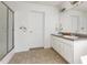 Bathroom with a shower, dual sinks, and a neutral color scheme at 168 Hoss Ridge Ln, Dunn, NC 28334