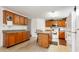 Functional kitchen design with island seating, abundant cabinetry, and modern appliances at 168 Hoss Ridge Ln, Dunn, NC 28334