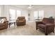 Bright, airy living room with cozy seating arrangements and ample space for entertaining at 168 Hoss Ridge Ln, Dunn, NC 28334