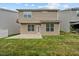 A well-maintained backyard with a patio and lush lawn at 1839 Huntley Way, Burlington, NC 27215