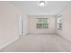 Inviting bedroom with plush carpeting, bright windows, and a comfortable layout at 1839 Huntley Way, Burlington, NC 27215