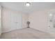 Neutral bedroom with plush carpet, double door closet, and a fan for extra comfort at 1839 Huntley Way, Burlington, NC 27215