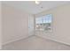 Bedroom featuring plush carpet, a window with blinds, and neutral-colored walls at 1839 Huntley Way, Burlington, NC 27215