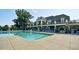 Large community pool with a lap area, ample deck space, and lounge chairs for sunbathing at 1839 Huntley Way, Burlington, NC 27215