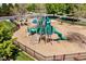Well-maintained playground with climbing structures, slides, and a soft landing surface at 1839 Huntley Way, Burlington, NC 27215