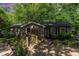 Inviting single story home with walkway and well-tended garden beds, offering a peaceful and welcoming curb appeal at 2029 Atkins Dr, Raleigh, NC 27610