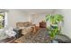 Cozy living room with neutral walls, a comfortable recliner sofa, and decor creating a warm atmosphere at 2029 Atkins Dr, Raleigh, NC 27610