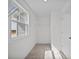 A walk-in closet with shelving and a bright window at 246 Pretty Run Branch Ln, Wendell, NC 27591