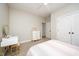 Bright bedroom features neutral walls, carpeted floor, ceiling fan, and double door closet at 25 Williamston Ridge Dr, Youngsville, NC 27596