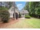 Inviting home exterior with a tidy lawn, lush landscaping, and a welcoming front entrance at 25 Williamston Ridge Dr, Youngsville, NC 27596