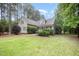 Attractive home showcasing well-maintained landscaping, green grass, and a classic facade at 25 Williamston Ridge Dr, Youngsville, NC 27596