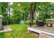 Backyard featuring a patio with seating and a firepit at 2517 Medway Dr, Raleigh, NC 27608