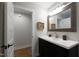 This bathroom offers a sleek vanity with modern fixtures and convenient storage at 2517 Medway Dr, Raleigh, NC 27608