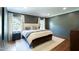 Comfortable bedroom featuring hardwood floors, soft lighting, and a cozy atmosphere at 2517 Medway Dr, Raleigh, NC 27608