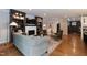 Inviting living room boasts built-in shelving, a cozy fireplace, and seamless access to the kitchen at 2517 Medway Dr, Raleigh, NC 27608