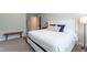 This main bedroom features a large bed, neutral colors and bright light at 2517 Medway Dr, Raleigh, NC 27608