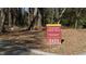 Crabtree Creek Trail sign amidst wooded area, advertising nearby recreational resources along the Capital Area Greenway at 2517 Medway Dr, Raleigh, NC 27608