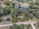 Aerial view of property showing lake view, mature trees, and property line at 2608 Knightwood Rd, Fuquay Varina, NC 27526