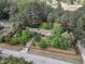 Aerial view of home showing mature trees surrounding the home, and property line at 2608 Knightwood Rd, Fuquay Varina, NC 27526