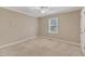 Bedroom features carpet, ceiling fan, and window with mini-blinds at 2608 Knightwood Rd, Fuquay Varina, NC 27526