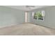 Bedroom with neutral carpet, ceiling fan, and a window with a view at 2608 Knightwood Rd, Fuquay Varina, NC 27526