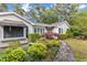 Inviting home exterior with stone pathway and lush landscaping at 2608 Knightwood Rd, Fuquay Varina, NC 27526