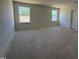 Bedroom featuring two windows and neutral paint at 2628 Pivot Ridge Dr, Raleigh, NC 27616