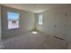 Bedroom with two windows, one on each wall at 2628 Pivot Ridge Dr, Raleigh, NC 27616