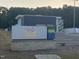 Amazing Explorers Academy sign with colorful logo and the school building in the background at 270 Wendover Pkwy, Pittsboro, NC 27312