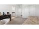 Bedroom with neutral carpet floors, white walls, and an antique dresser at 270 Wendover Pkwy, Pittsboro, NC 27312