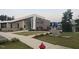 View of the Paddles pool and pickleball clubhouse with neat landscaping at 270 Wendover Pkwy, Pittsboro, NC 27312