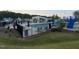 Community pool with lounge chairs and a large water slide at 270 Wendover Pkwy, Pittsboro, NC 27312
