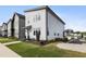 Modern home featuring a landscaped yard with a well-manicured lawn and inviting curb appeal at 270 Wendover Pkwy, Pittsboro, NC 27312