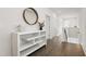 Bright upstairs hallway with console table, decor and access to the rest of the home at 270 Wendover Pkwy, Pittsboro, NC 27312