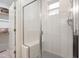 Clean, bright shower with glass enclosure, tiled walls, and integrated bench seating at 270 Wendover Pkwy, Pittsboro, NC 27312