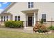 Inviting entrance to this home features a lovely front door framed by lush landscaping at 2737 Casper Creek Ln, Raleigh, NC 27616