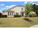 Charming two-story home features a manicured lawn, landscaping, and inviting curb appeal at 2737 Casper Creek Ln, Raleigh, NC 27616