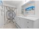 Stylish bathroom with a white vanity, a large mirror, and a shower with a decorative curtain at 3005 Buckhorn Rd, Sanford, NC 27330