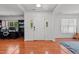 Inviting entryway featuring hardwood floors, white trim, and lots of natural light at 3005 Buckhorn Rd, Sanford, NC 27330