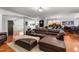 Spacious living room featuring a large sectional sofa and open layout at 3005 Buckhorn Rd, Sanford, NC 27330